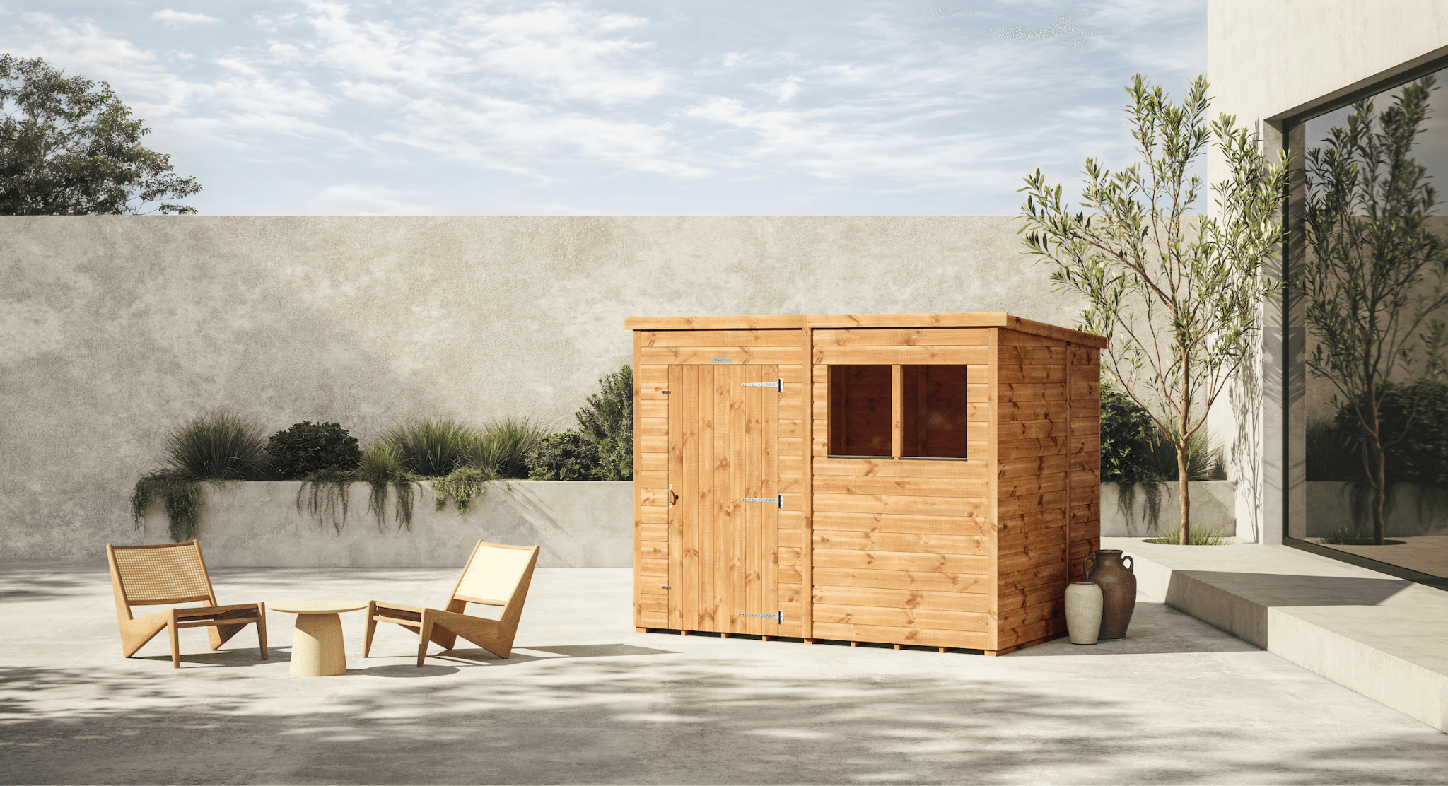 Modern wooden sauna with chairs on sunlit patio