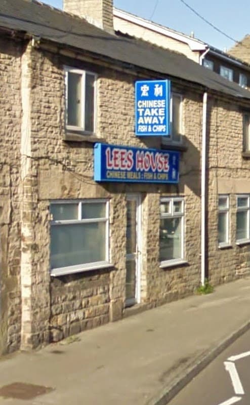 Lee's House restaurant with a blue sign, stone facade, and windows, located on a street in Deepcar, Yorkshire.