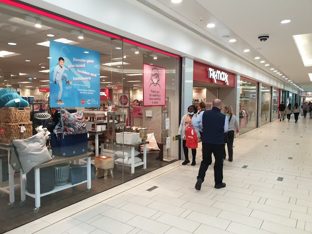 Frenchgate shopping center in Doncaster, featuring storefronts, shoppers, and promotional signage.