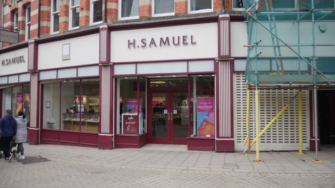 H. Samuel jewellers storefront in Eckington, featuring large windows and promotional signage. Scaffolding visible nearby.