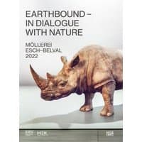 "Earthbound" book cover featuring a realistic rhinoceros sculpture on a light background.