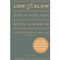 "Green book titled 'Low and Slow' by Neil Rankin, featuring gold text and a circular orange sticker on the cover"