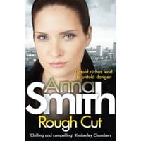 Book cover "Rough Cut" by Anna Smith, featuring a woman's face over a cityscape background with bold white text.