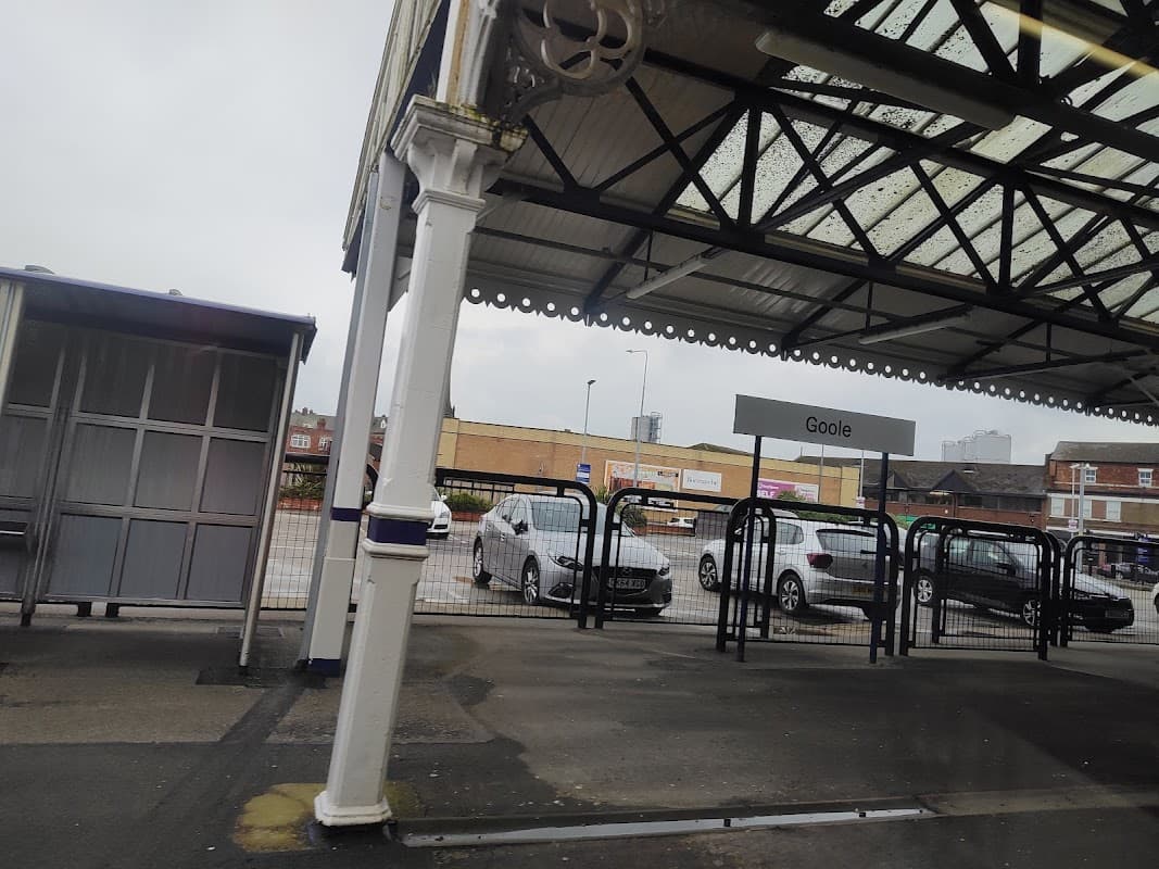Pay & Display parking area in Goole, Yorkshire, with parked cars and a sign indicating "Goole."