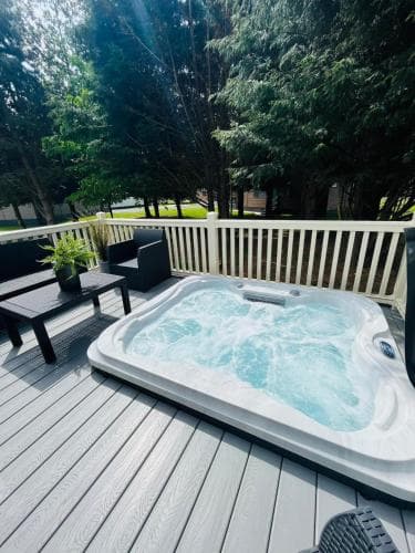 Woodpark Lodge with Hot Tub Image 3