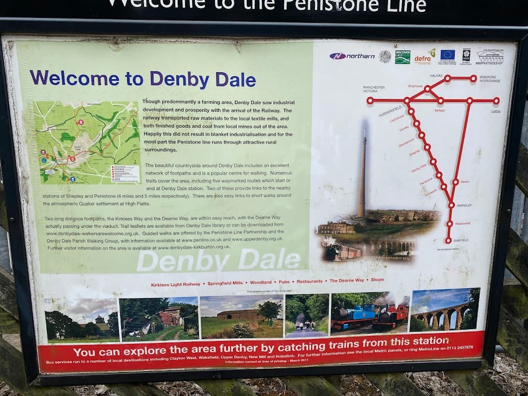 Sign welcoming visitors to Denby Dale, with a map and images of local attractions and a railway line diagram.