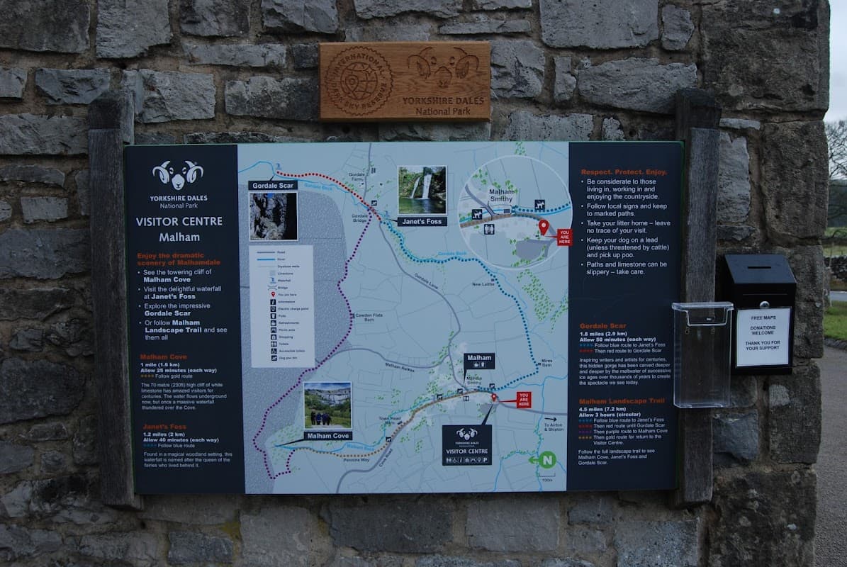 Chapel Gate Parking sign with a map of Malham, highlighting trails and visitor information in Yorkshire Dales National Park.