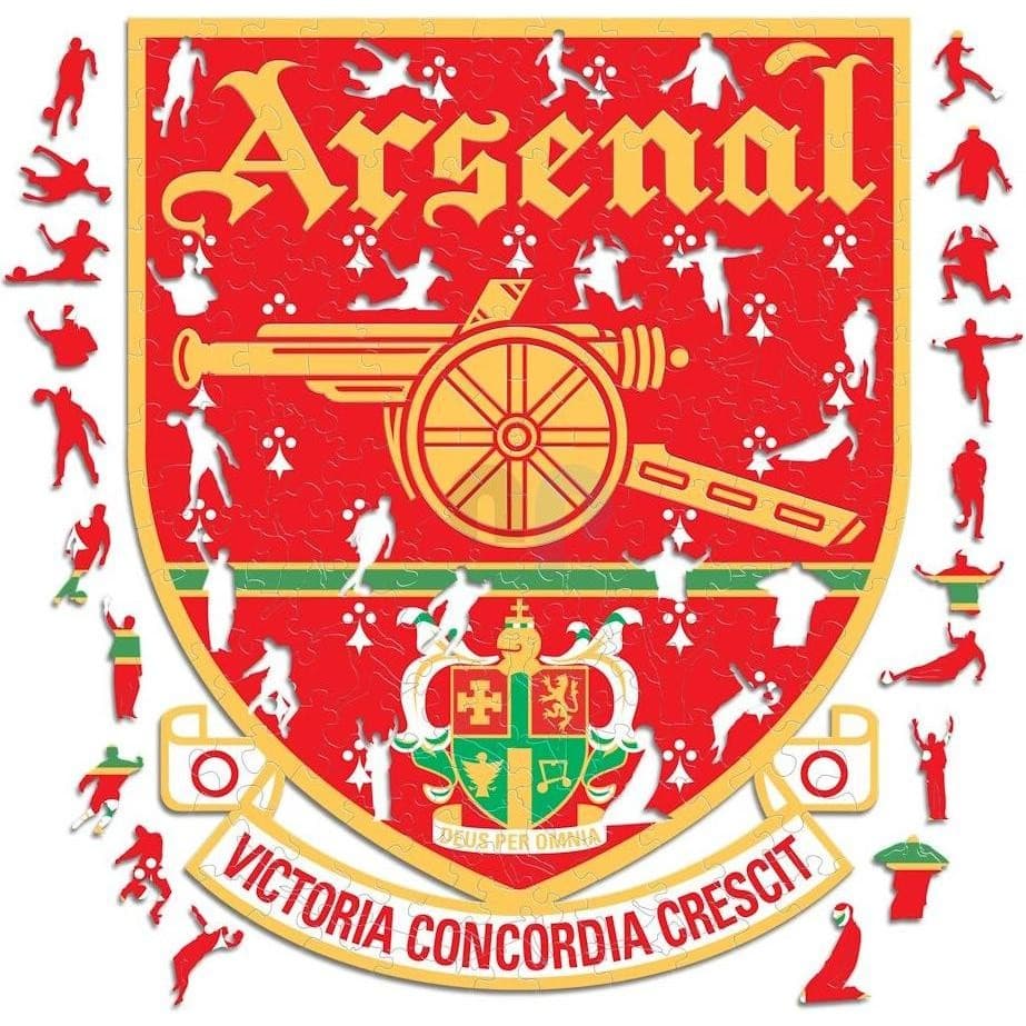 Wooden puzzle featuring the iconic red and gold Arsenal FC logo, with 500 pieces depicting the cannon and club motto "Victoria Concordia Crescit."