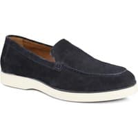 Navy suede slip-on shoes with white sole, leather upper, and subtle stitching detail.