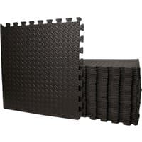 Black 60cm x 60cm interlocking EVA foam floor mats, textured surface, 16-piece set stacked and partially assembled.