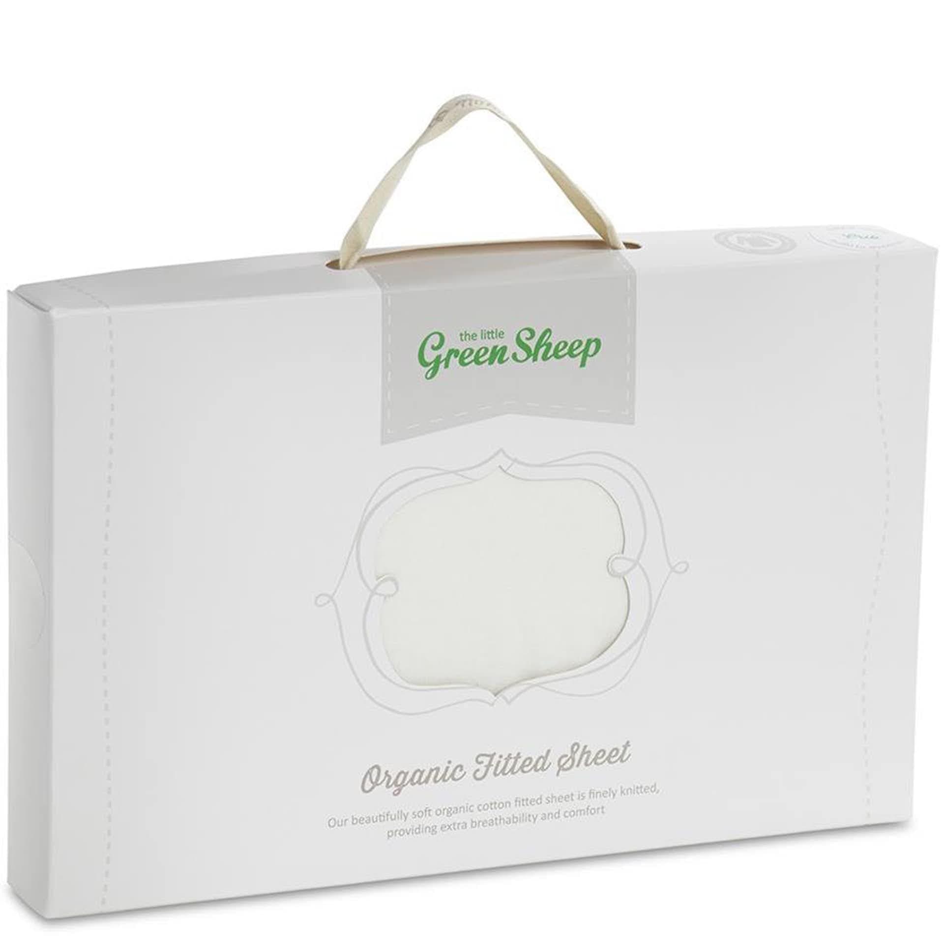 White packaging featuring a handle, labeled "Organic Fitted Sheet" by The Little Green Sheep, showcasing a soft, organic cotton jersey material for Moses baskets.