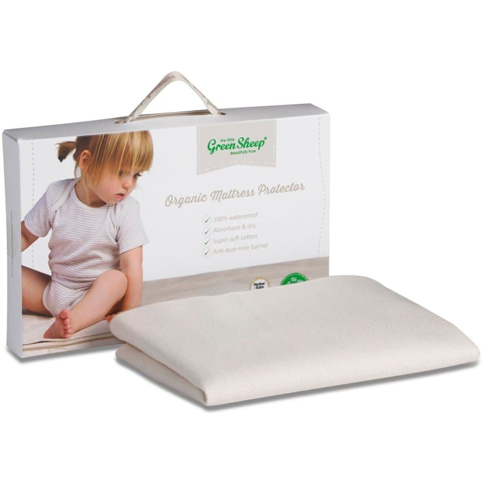 Organic Moses basket mattress protector in a soft cream color, made from 100% waterproof organic cotton, featuring a convenient carry handle and eco-friendly packaging.