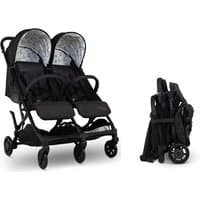 Black Cosatto Yo! Double stroller with fox pattern canopy, dual seats, and compact foldable design.