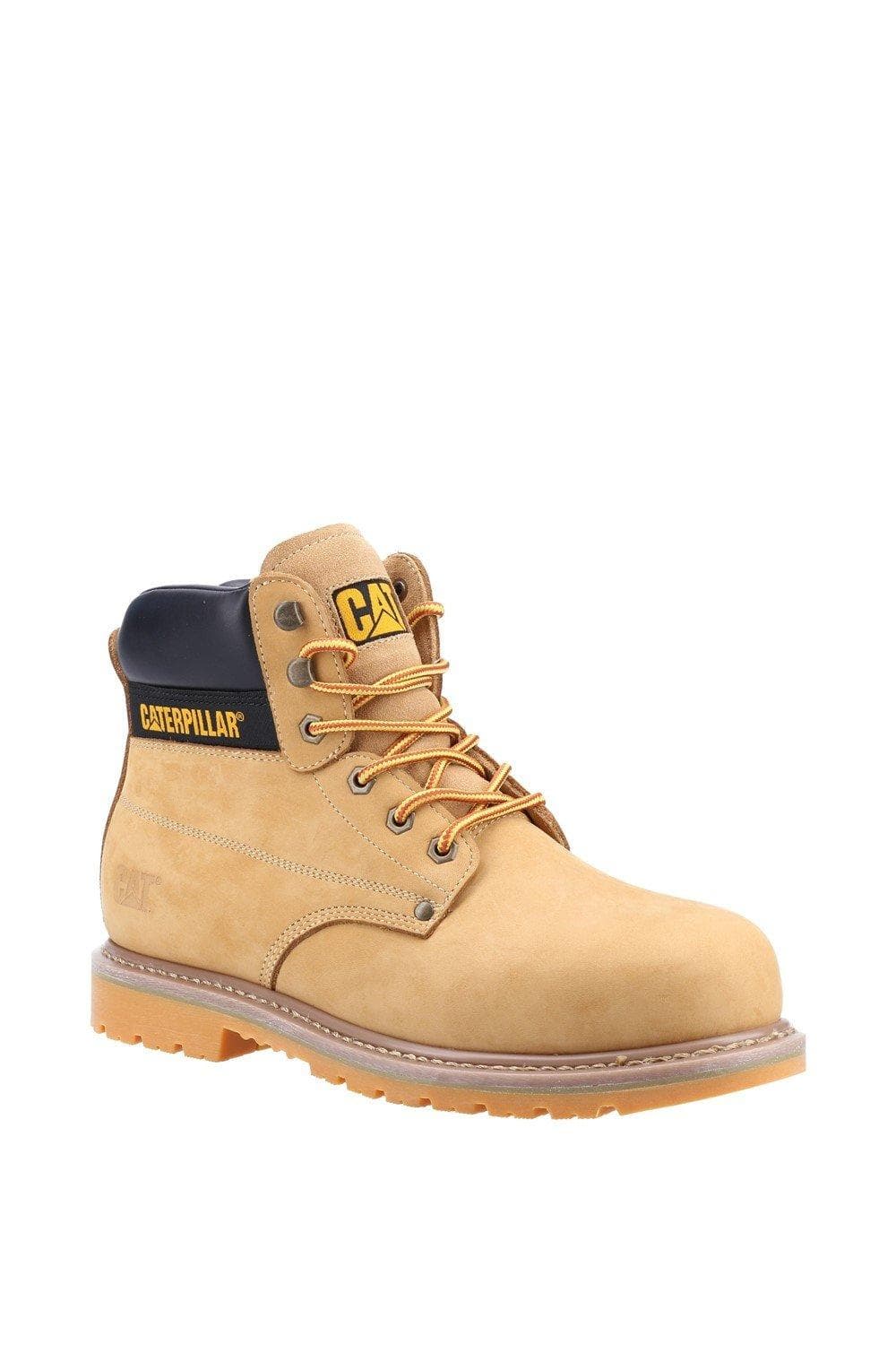 Tan suede men's boots featuring a black collar, yellow laces, and a sturdy rubber sole, with a prominent yellow "CATERPILLAR" logo on the side.
