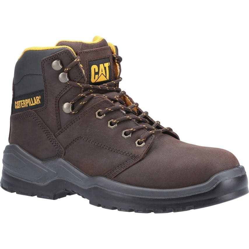 Brown leather safety boot with yellow accents, featuring metal eyelets, padded collar, and a sturdy rubber sole, designed for durability and comfort in work environments.