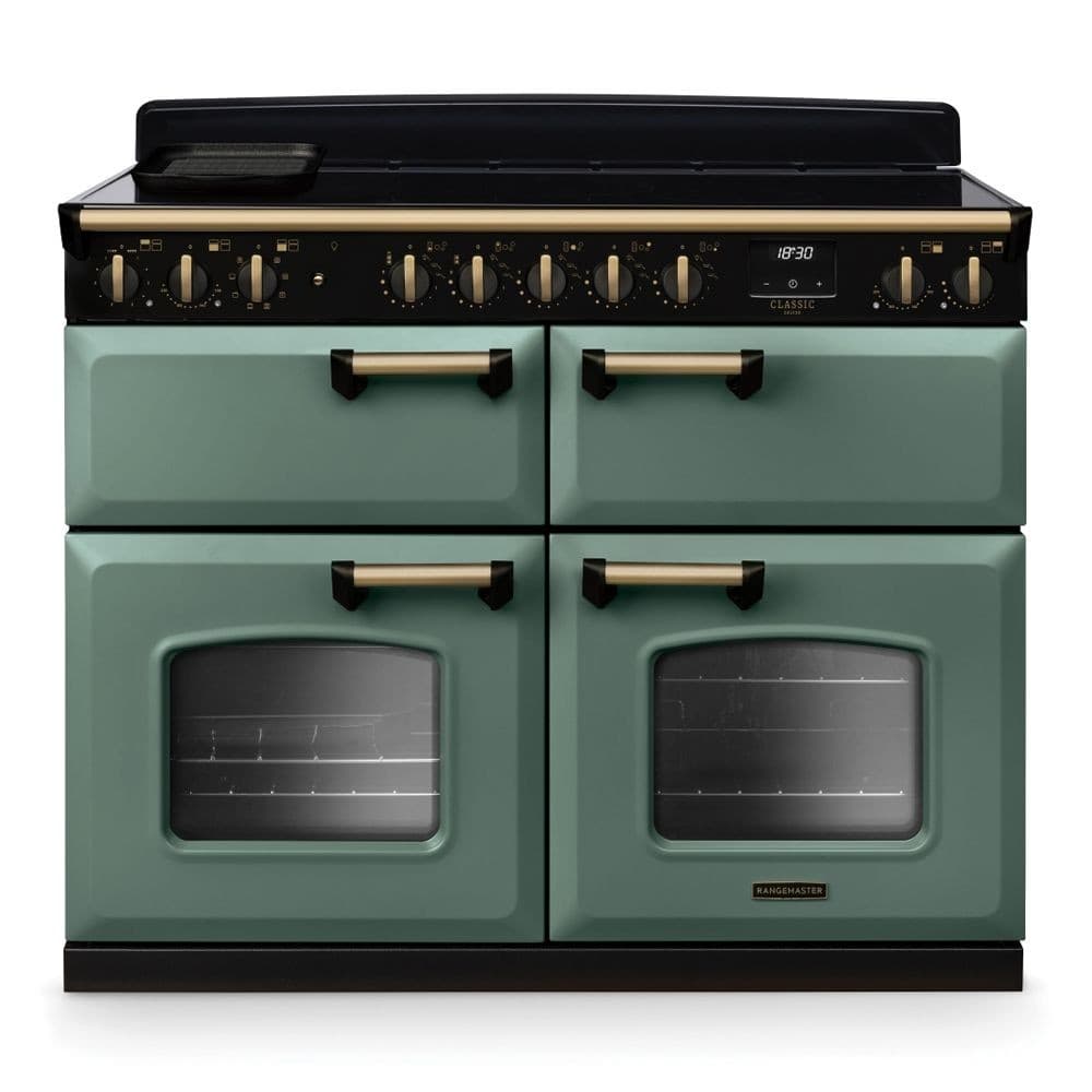 Classic Deluxe 110cm BC induction range cooker in mineral green with antique brass accents, featuring four ovens, a sleek black top, and stylish control knobs.