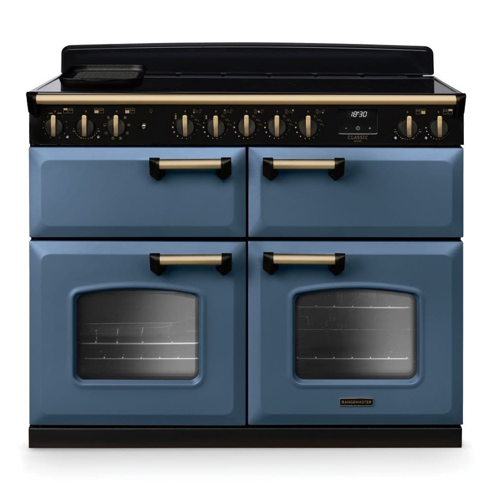 Classic Deluxe 110cm BC range cooker in stone blue with antique brass accents, featuring four ovens, multiple knobs, and a sleek black top surface.