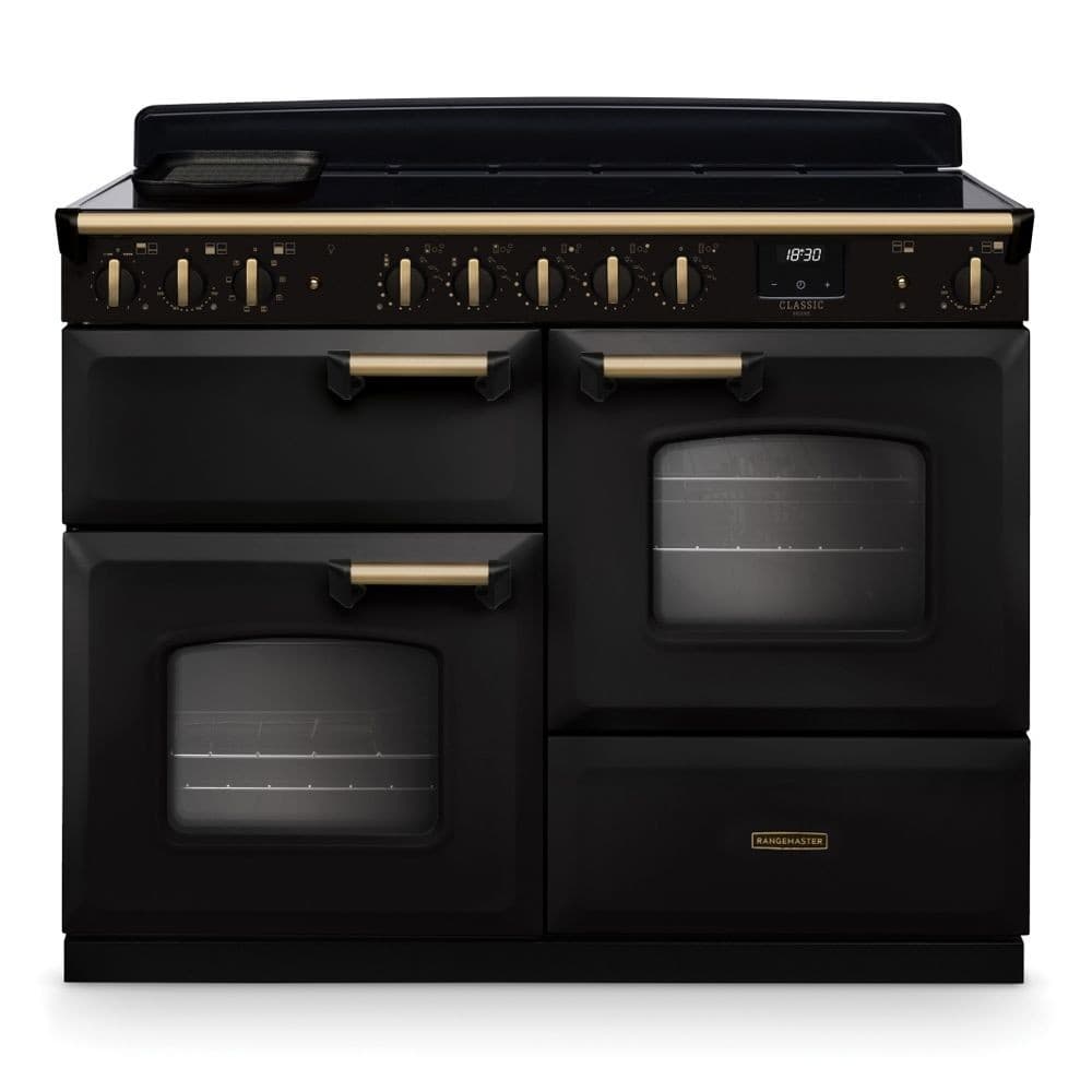 Classic Deluxe 110cm induction range cooker in charcoal black with antique brass accents, featuring five knobs, dual ovens, and a sleek, modern design.
