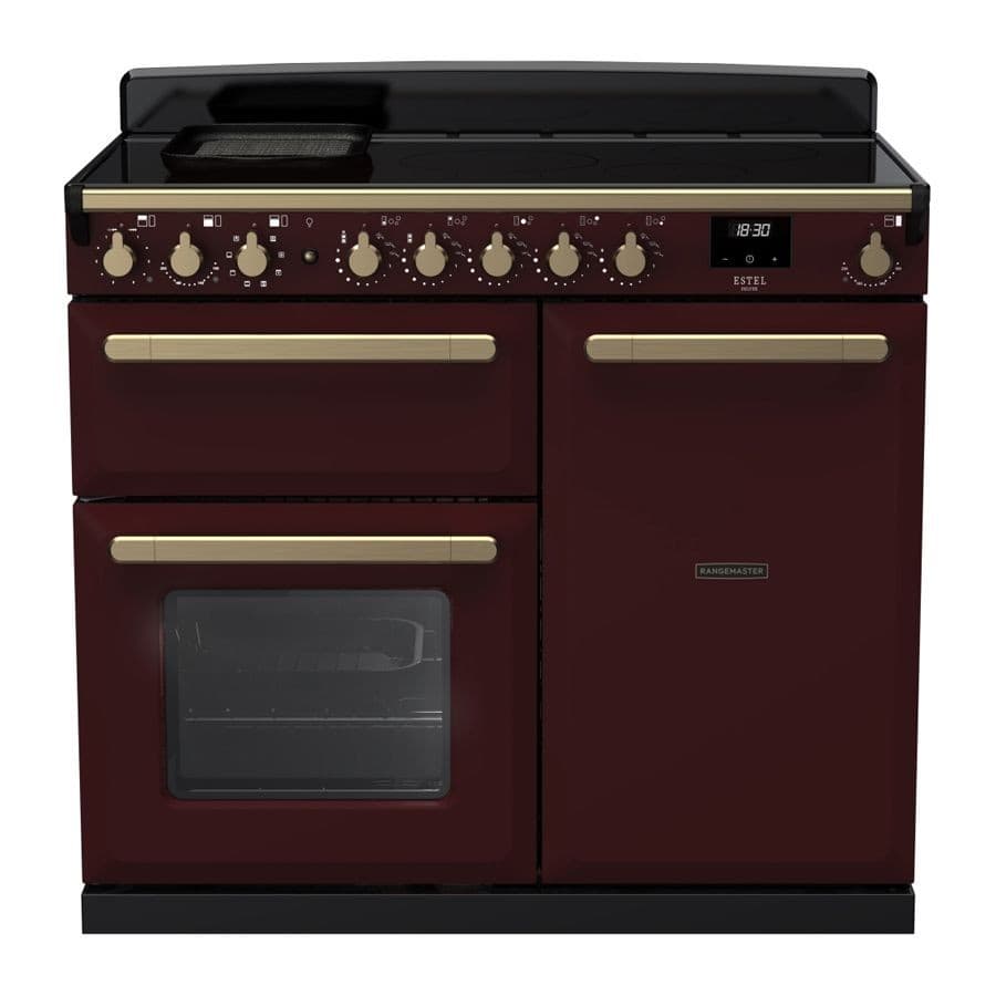 Bordeaux induction range cooker with antique brass knobs, featuring a sleek black top, two ovens, and a stylish design by Rangemaster.