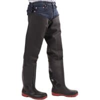 Black Amblers Safety thigh wader boots with red soles, knee-high design, worn over blue jeans.