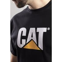 Black Caterpillar T-shirt with bold white "CAT" logo and yellow triangle on chest, worn by a person.