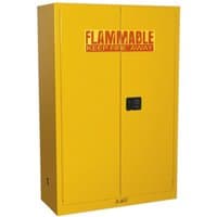 Yellow Sealey flammables storage cabinet with two doors, safety label, and black handle.