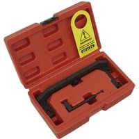 Red Sealey timing tool kit with black metal components in a molded case, designed for PSA, GM, and Toyota engines.