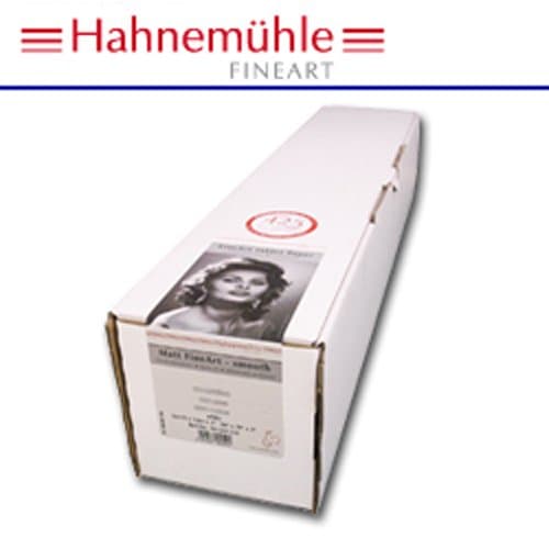 White cardboard box with a label featuring a black-and-white portrait, indicating "Hahnemühle Photo Rag, 44in, 12m, 308gsm," showcasing a fine art paper product.