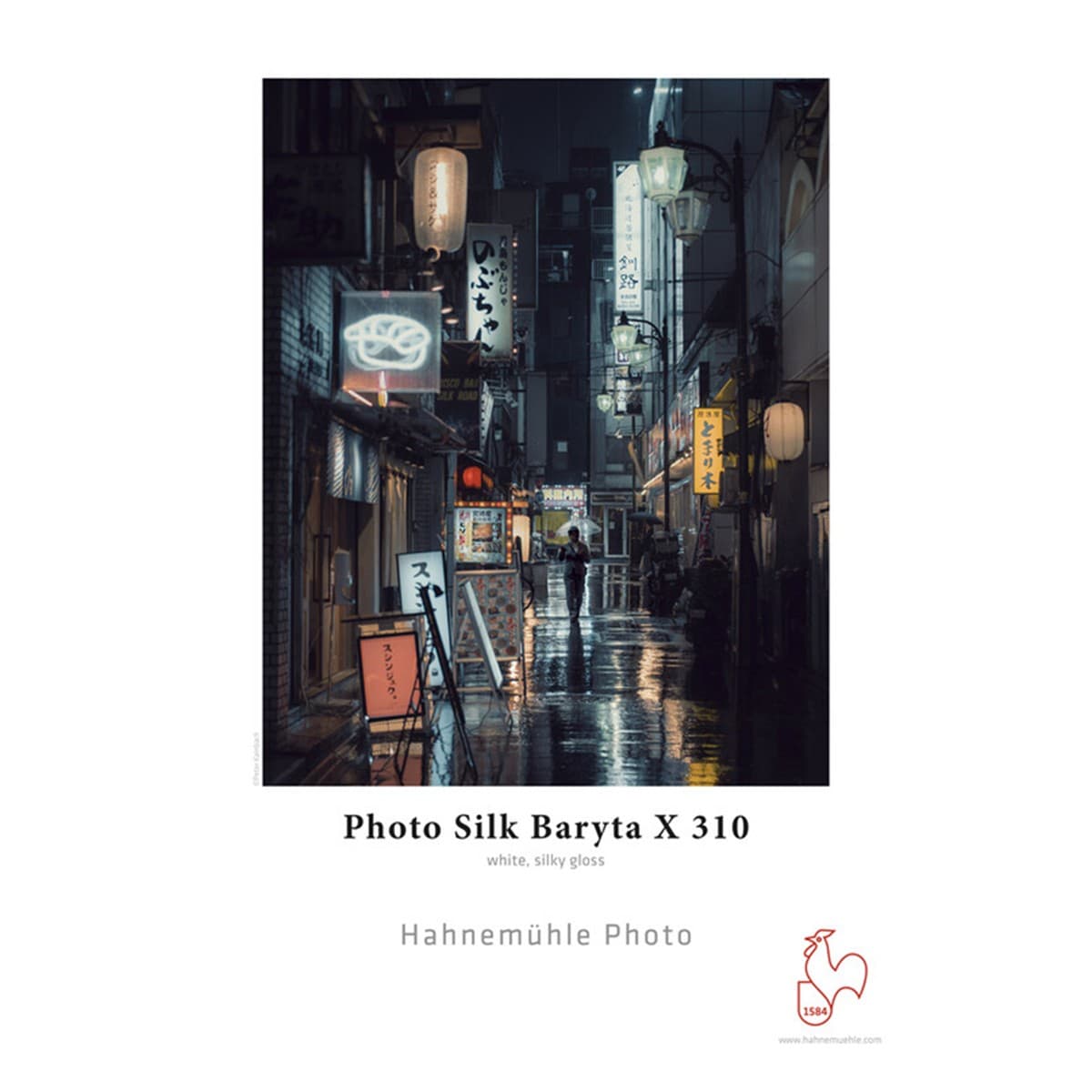 White, silky gloss paper roll labeled "Photo Silk Baryta X 310," measuring 24 inches by 5 meters, featuring a sleek, smooth texture ideal for high-quality prints.