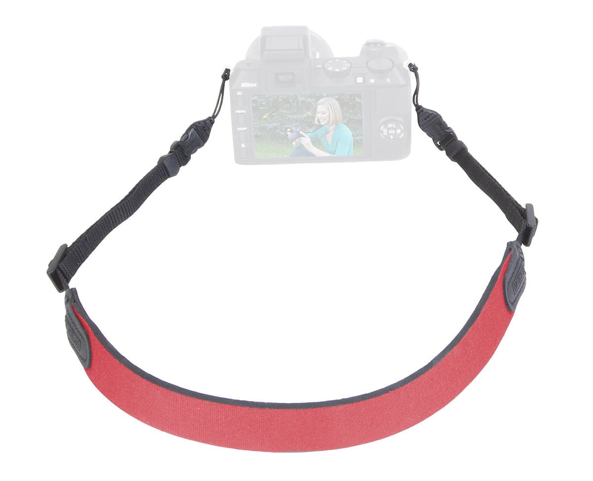 Red padded camera strap with black adjustable ends, featuring quick-release clips for easy attachment and removal, designed for comfort and stability during use.