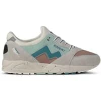 Karhu Aria 95 sneakers in gray with teal and pink accents, suede upper, and speckled midsole.