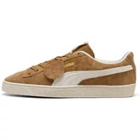Brown suede Puma sneaker with white side stripe, gold logo, and beige sole.