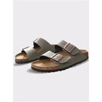 Birkenstock Arizona sandals in stone nubuck, featuring two adjustable straps with silver buckles and a cork footbed.
