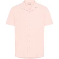 Light pink short-sleeve blouse with a button-down front and a notched collar.