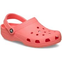 Guava pink Crocs Classic thermoplastic sandals with ventilation holes and adjustable heel strap.