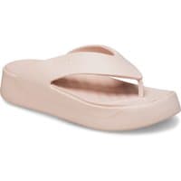 Beige Crocs platform sandals with a wide strap, open toe, and textured footbed.