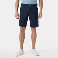 Navy Helly Hansen men's cargo shorts with side pockets and button closure, worn by model with white sneakers.