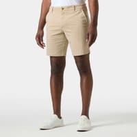 Beige Helly Hansen men's chino shorts, size 34, with button closure and side pockets.