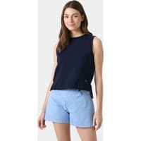 Navy blue sleeveless women's top with round neck, relaxed fit, and subtle logo detail at the hem.