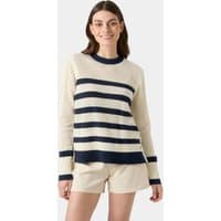 Navy and cream striped knit sweater with crew neck and long sleeves, worn by a woman.