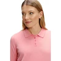 Pink women's pullover with a collared neckline and button placket, worn by a model with long blonde hair.