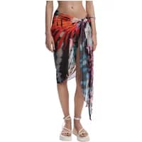 Colorful Jungle Sarong by Desigual, featuring vibrant abstract patterns in red, blue, and black, tied at the waist.