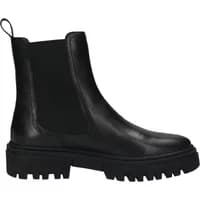 Black leather Chelsea boots for women by TT.Bagatt with elastic side panels and chunky lug soles.