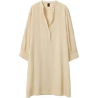 Cream linen shirt dress with long sleeves, V-neckline, and loose fit by Stefanel.