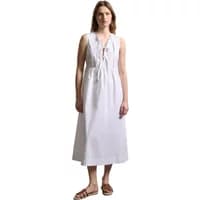 White long lace-up collar dress, sleeveless, mid-calf length, worn by a woman, by Stefanel.