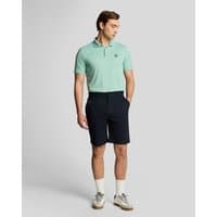 Navy Lyle & Scott men's golf chino shorts with stretch fabric, tailored fit, and belt loops.