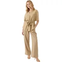 Beige wide-leg women's trousers with a high waist and belt, paired with a matching short-sleeve top.