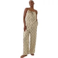 Beige Artlove Miralis women's pants with black vertical stripes, loose fit, and elastic waistband.