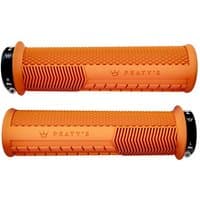 Orange Peaty's Monarch Knurl Grip, thick design, textured surface, black end caps with logo.