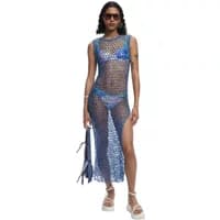 Blue sequin knit sarong by Desigual, sleeveless with side slit, worn over matching bikini, accessorized with sunglasses.